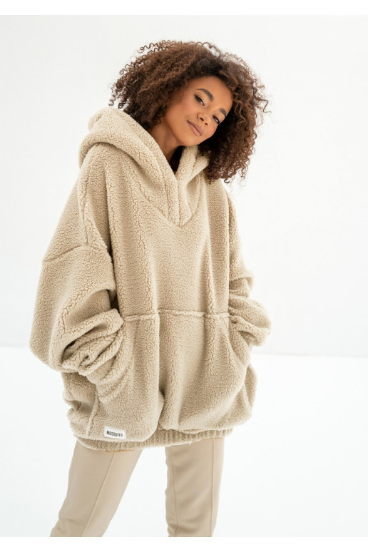 Ozzy - oversize smilškrāsas džemperis ar kapuci