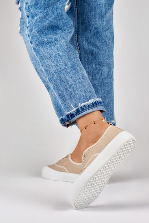 Sieviešu smilškrāsas treniņbikses ar... Sieviešu smilškrāsas treniņbikses ar...