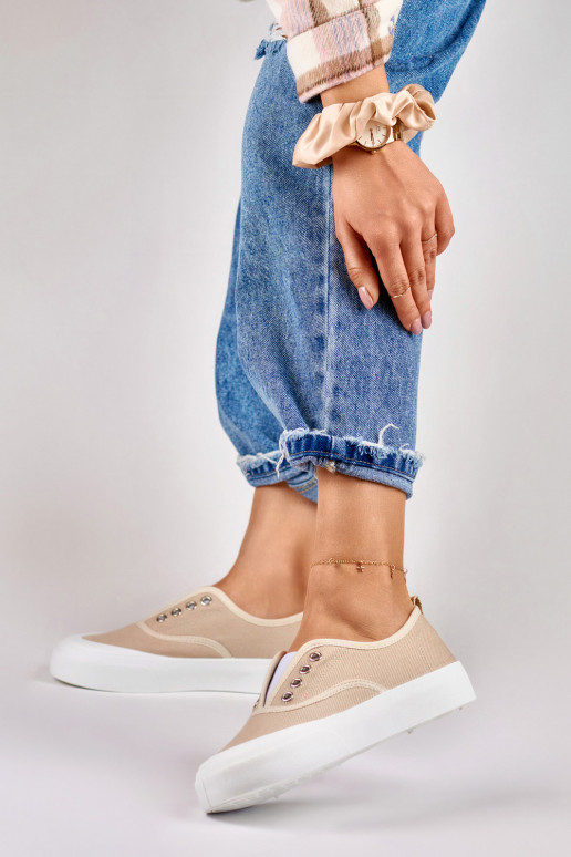 Sieviešu smilškrāsas treniņbikses ar... Sieviešu smilškrāsas treniņbikses ar...