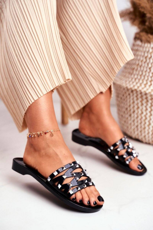 Plätud mustad kummist neetidega Patty