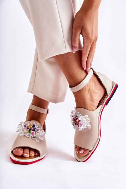 Sandales ar ornamentiem smilšu krāsas...