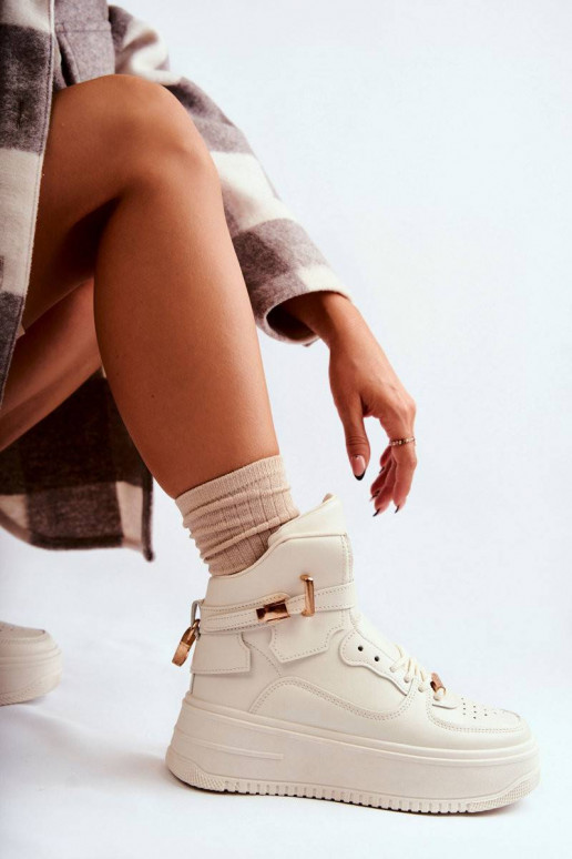 siltināti sporta apavi smilšu krāsas...