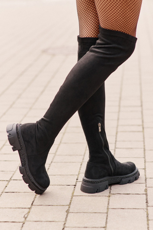 Sieviešu garie zābaki virs ceļgaliem...