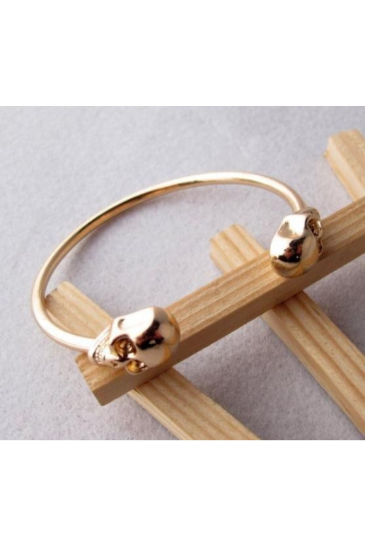 Apyrankė "Dvi kaukolės" aukso spalvos Apyrankė "Dvi kaukolės" aukso spalvos