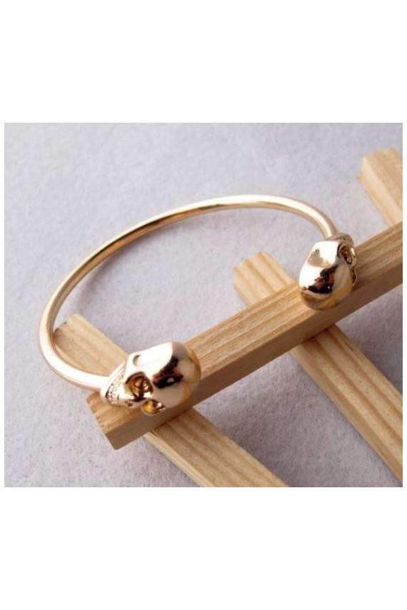 Apyrankė "Dvi kaukolės" aukso spalvos