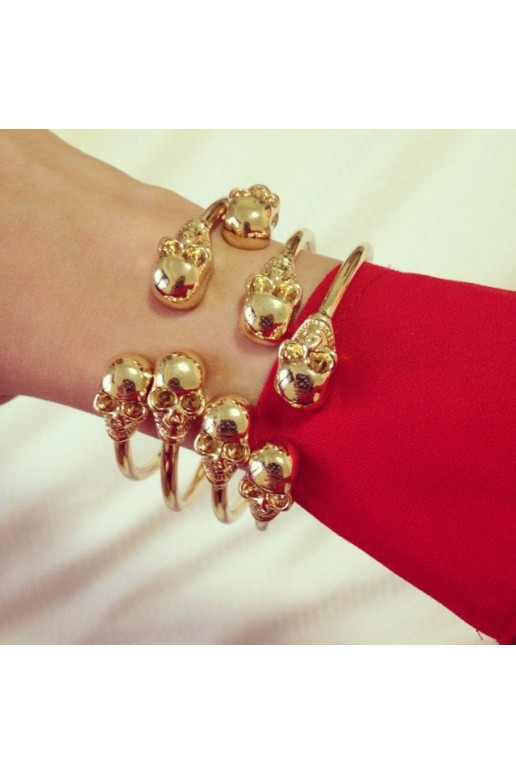 Apyrankė "Dvi kaukolės" aukso spalvos Apyrankė "Dvi kaukolės" aukso spalvos