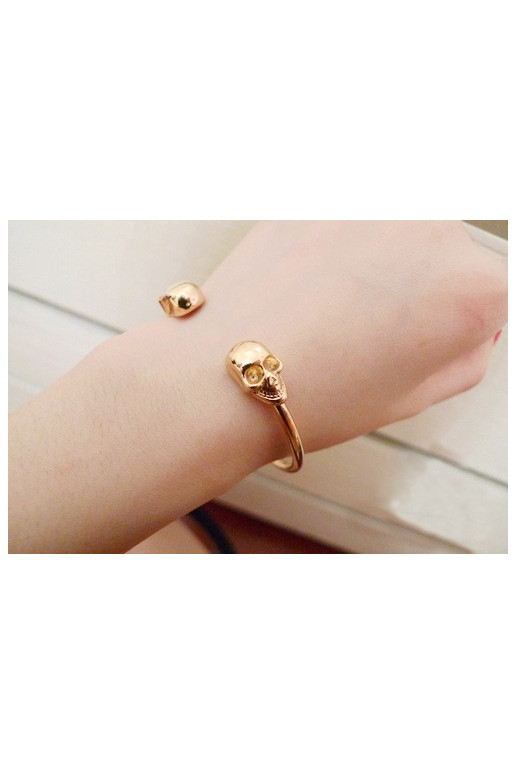 Apyrankė "Dvi kaukolės" aukso spalvos Apyrankė "Dvi kaukolės" aukso spalvos