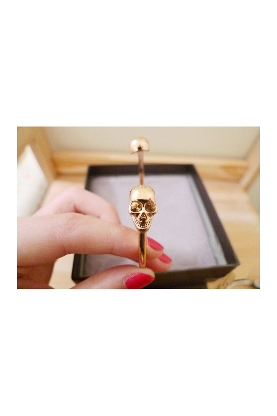 Apyrankė "Dvi kaukolės" aukso spalvos