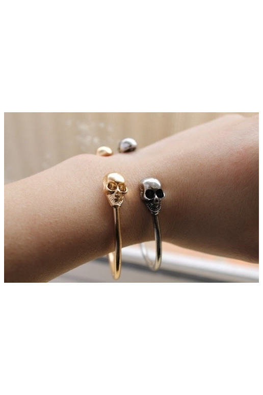 Apyrankė "Dvi kaukolės" aukso spalvos Apyrankė "Dvi kaukolės" aukso spalvos